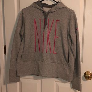 Grey and Pink Nike hoodie.